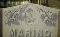 Raised Lillies Monument Round Raised Letters
